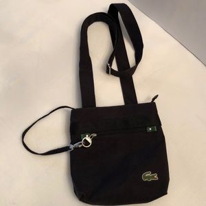 Lacoste nylon cross body bag.